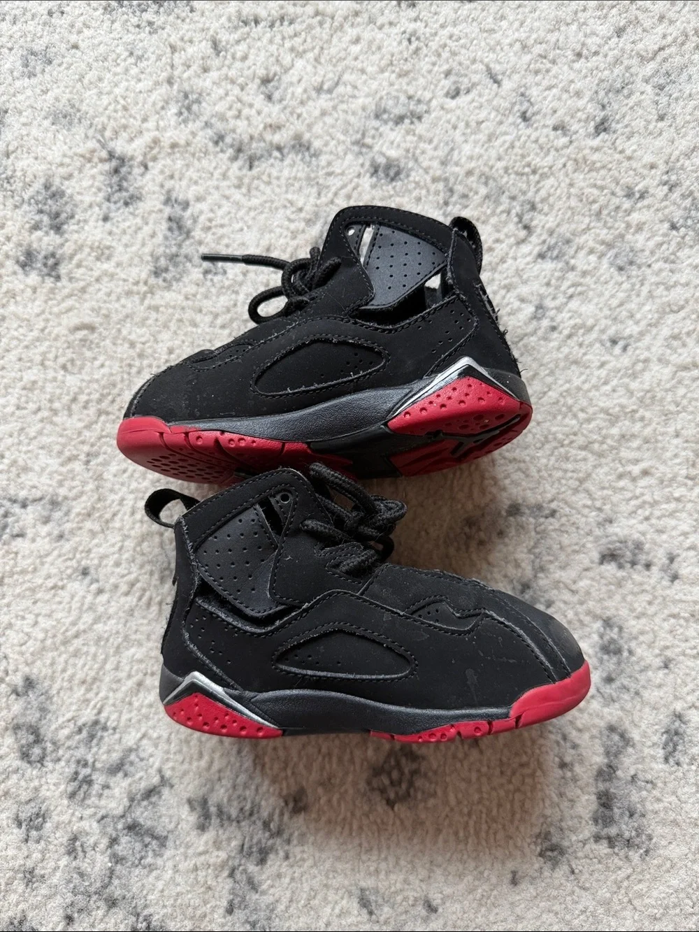 Jordan Kids size 7C shoes. Shows signs of wear.